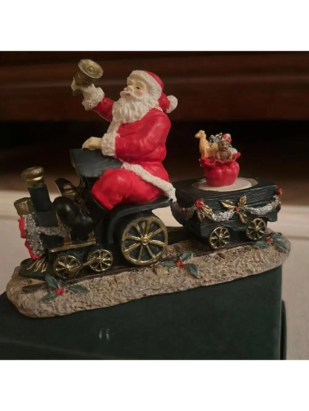 Vintage Santa Claus figurine riding a train w presents